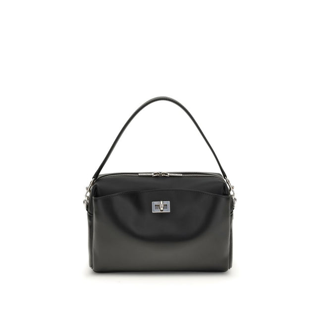 Black Calf Leather Bos Taurus Shoulder BagThe Rodeo Camera Bag by Balenciaga is crafted from smooth black calf leather with antique silver-tone hardware. Versatile and practical, it can be worn crossbody, over the shoulder, or by hand, thanks to the remov