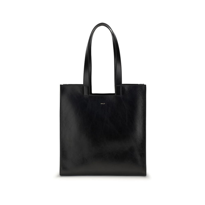Black Calf Leather Bos Taurus Shoulder BagThe Bally Tote Bag is reimagined in a simple, minimalist style, featuring clean lines and a versatile shape suitable for any occasion. Made from calf leather with crêpe finishes, it features a gold-laminated logo,