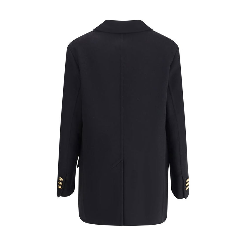 Black Cashmere CoatThe Double-breasted Coat in wool and cashmere blend by Versace combines sartorial elegance with iconic details. The notched lapel, long sleeves, and front patch pockets enhance the coat’s classic lines, while the Safety Pin accessory an