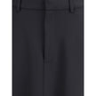 Black Fleece Wool Long SkirtBalenciaga’s virgin wool Godet skirt-trousers feature a mid-rise waist, front buttons, belt loops and inner pants for a versatile and refined style. Season: AW25 Fit: Regular Composition: 100% Fleece Wool MADE IN ITALYBlack Fle