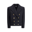 Black Wool CoatThe double-breasted coat by Balmain combines sophistication with contemporary modernity. Crafted from fine wool, its streamlined silhouette with broad shoulders and wide lapels flatters the figure, while the engraved gold buttons, decorativ
