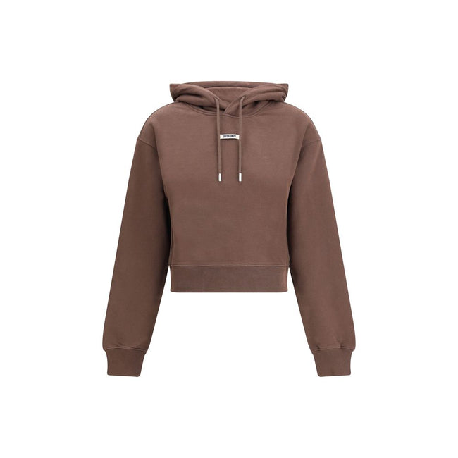 Logoed HoodieCotton Hoodie by Jacquemus, featuring an adjustable drawstring hood for a custom fit. Featuring a logo patch on the front, ribbed cuffs and hem for a finishing touch. The slim fit flatters the silhouette, combining comfort and contemporary st
