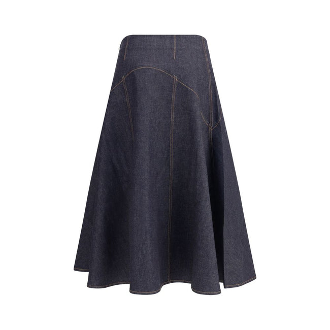Blue Cotton Midi SkirtThe denim midi Skirt by Jacquemus is a flared design with contrast stitching that enhances its structure. Featuring ‘J’ embroidery on the side and a side zipper closure, it combines a distinctive touch with a versatile, contemporary