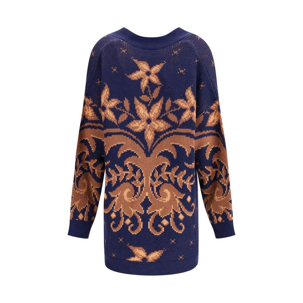 Multicolor Wool CardiganEtro’s wool jacquard Cardigan features a loose fit and a floral-inspired piazzato pattern. Made of warm jacquard wool, it features a V-neck, button closure and side patch pockets. The over fit gives the garment a relaxed and sophis