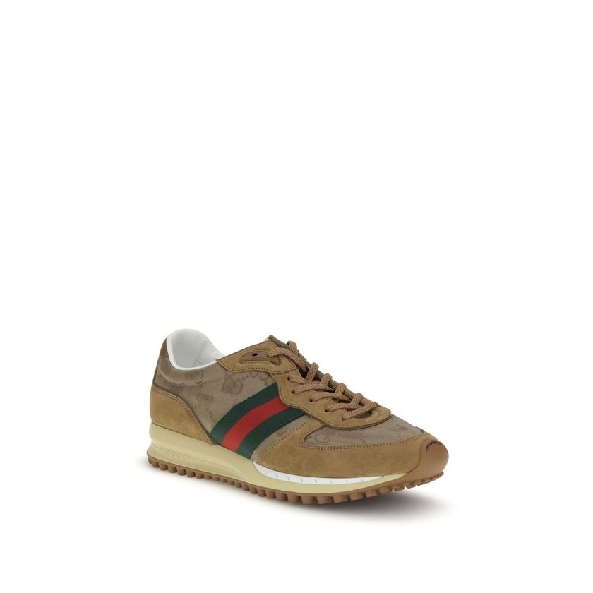 Beige Polyamide Athletic SneakersThe Nora Sneakers by Gucci combine sporty heritage and contemporary style. Crafted from black Original GG canvas with suede trim and GG nylon inserts, they feature the iconic green and red Web stripe on the sides. The rubb