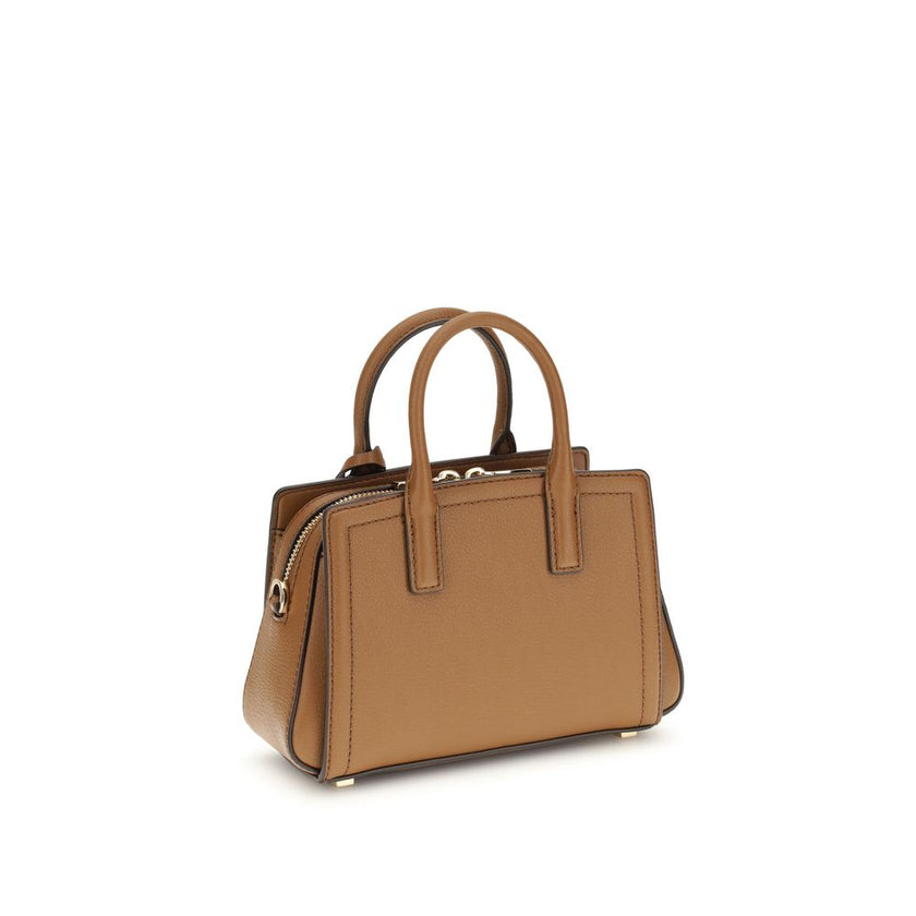 Laila Shoulder BagThe Laila Bag by Michael Kors is a compact and functional reinterpretation of the iconic model. Featuring an adjustable shoulder strap, top handle, and two-way zip closure, it has a compartmentalized interior designed for essentials. Shi