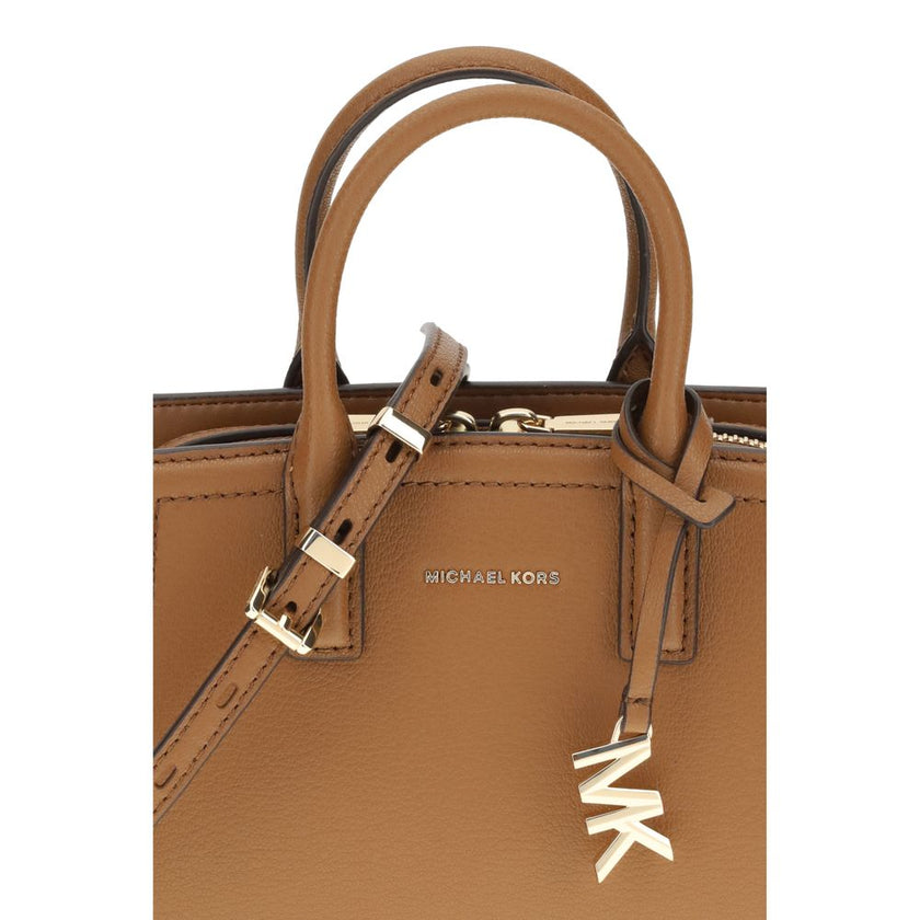 Laila Shoulder BagThe Laila Bag by Michael Kors is a compact and functional reinterpretation of the iconic model. Featuring an adjustable shoulder strap, top handle, and two-way zip closure, it has a compartmentalized interior designed for essentials. Shi