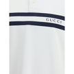 White Cotton Polo ShirtThe white stretch Cotton Polo Shirt by Gucci, with a relaxed and comfortable fit, is enhanced by a striped print and the Gucci logo centered on the front, for a modern and distinctive look. Season: AW25 Fit: Regular Composition: 95%