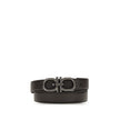 Brown Calf Leather Bos Taurus Regular BeltFerragamo’s Gancini Belt is a reversible, adjustable model designed for versatile elegance. The stitched rod lends a casual touch, while the ruthenium-finish buckle, with stylized double Gancini, adds character an