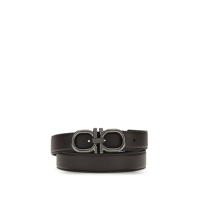 Brown Calf Leather Bos Taurus Regular BeltFerragamo’s Gancini Belt is a reversible, adjustable model designed for versatile elegance. The stitched rod lends a casual touch, while the ruthenium-finish buckle, with stylized double Gancini, adds character an