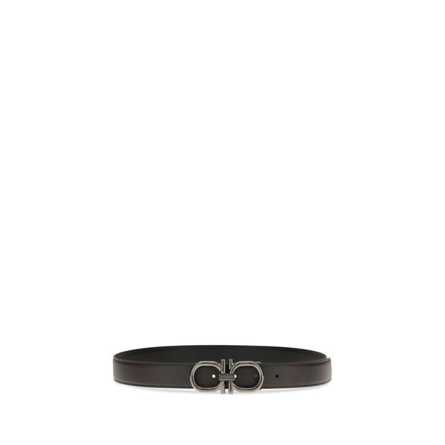 Brown Calf Leather Bos Taurus Regular BeltFerragamo’s Gancini Belt is a reversible, adjustable model designed for versatile elegance. The stitched rod lends a casual touch, while the ruthenium-finish buckle, with stylized double Gancini, adds character an