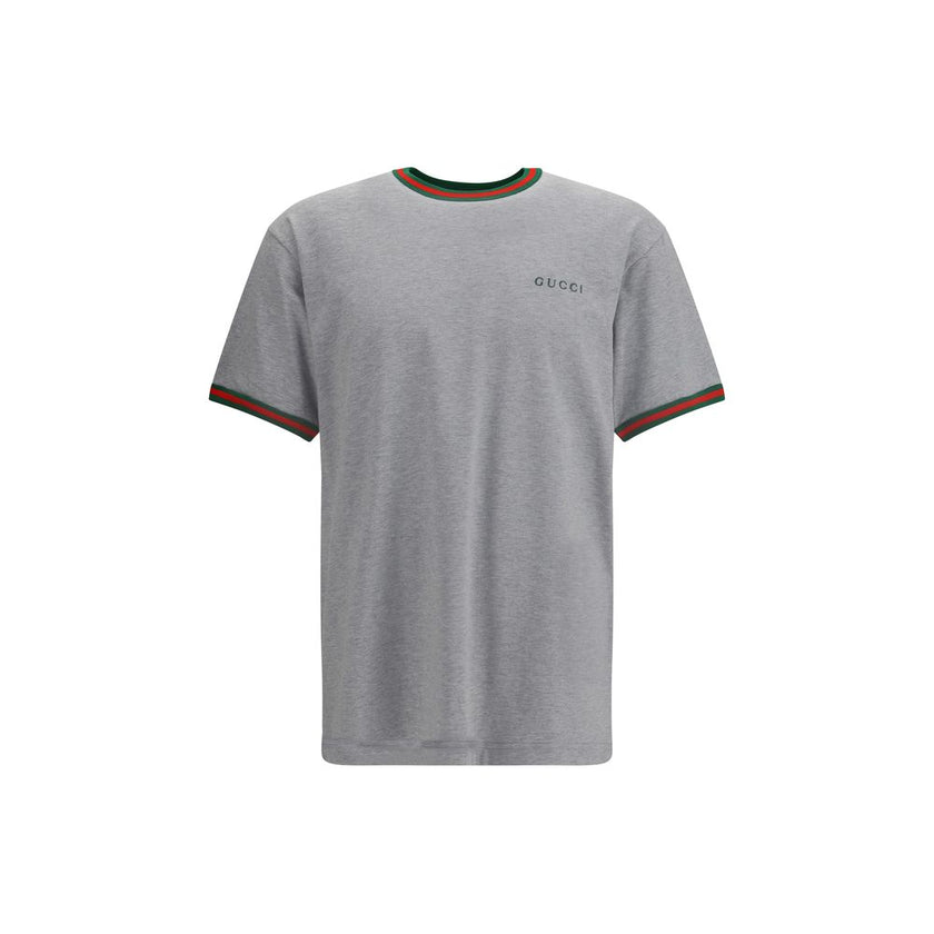 Gray Cotton T-ShirtLight grey melange cotton T-shirt with Gucci embroidery on the chest and contrasting Web details. Season: AW25 Fit: Regular Composition: 100% Cotton MADE IN ITALYGray Cotton T-Shirt${tagsGucciAulae Cotton T-shirt with embroidered logo G