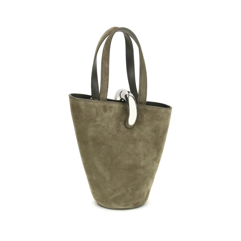 La Bambola Bucket BagThe La Bambola Bucket Bag by Jacquemus combines original design and functionality. Made from soft suede leather, it features double handles and a removable shoulder strap for versatile carrying options. The silver-tone metal ring clos