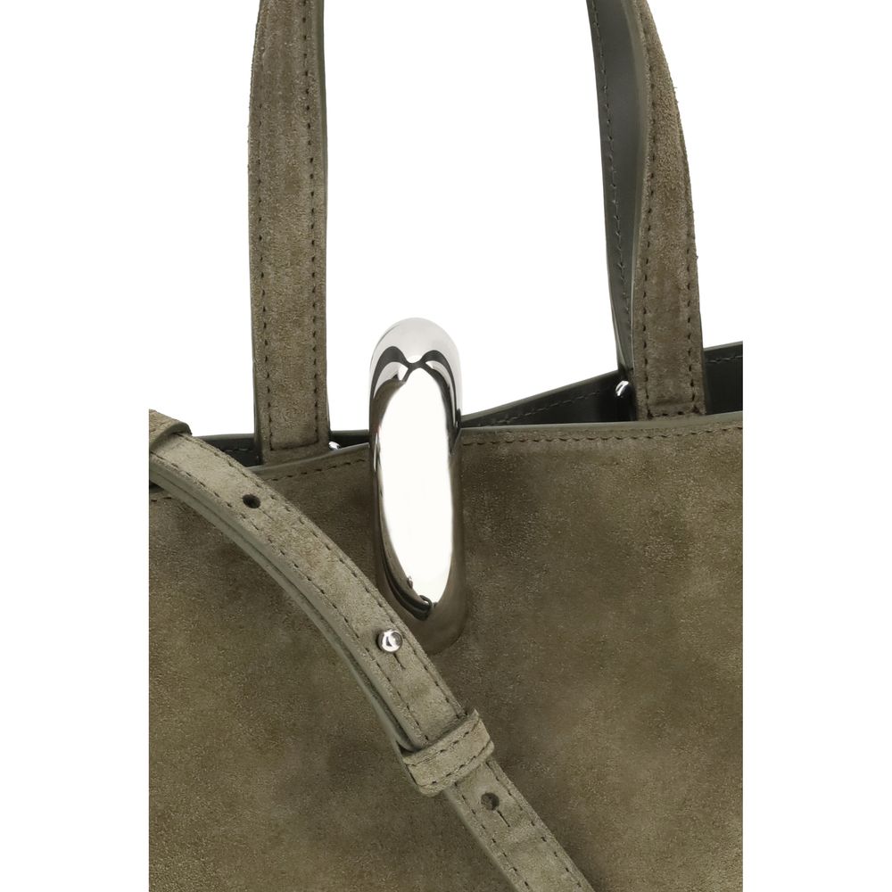 La Bambola Bucket BagThe La Bambola Bucket Bag by Jacquemus combines original design and functionality. Made from soft suede leather, it features double handles and a removable shoulder strap for versatile carrying options. The silver-tone metal ring clos