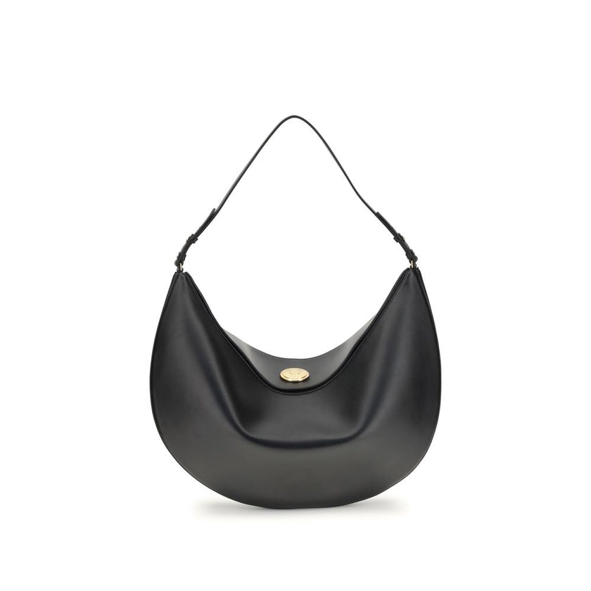 Black Calf Leather Bos Taurus Shoulder BagThe Ovalo Bag by Jacquemus is an elegant large hobo bag crafted from smooth leather, featuring a slim shoulder strap for easy carrying. The flap with a large engraved snap button ensures secure closure, while the