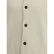 White Fleece Wool CardiganThe Virgin Wool Cardigan by Jacquemus combines elegance and comfort, featuring front buttons that emphasize its refined silhouette. The long sleeves and ribbed trims add a touch of classic style, while the embroidered detail on t