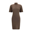 Brown Merino Wool Casual DressThe Jaquemus knit dress features structured shoulders, a high neckline, and short sleeves. With a fitted design, it combines elegance with contemporary character, perfect for a bold and refined look Season: AW25 Fit: Slim Com