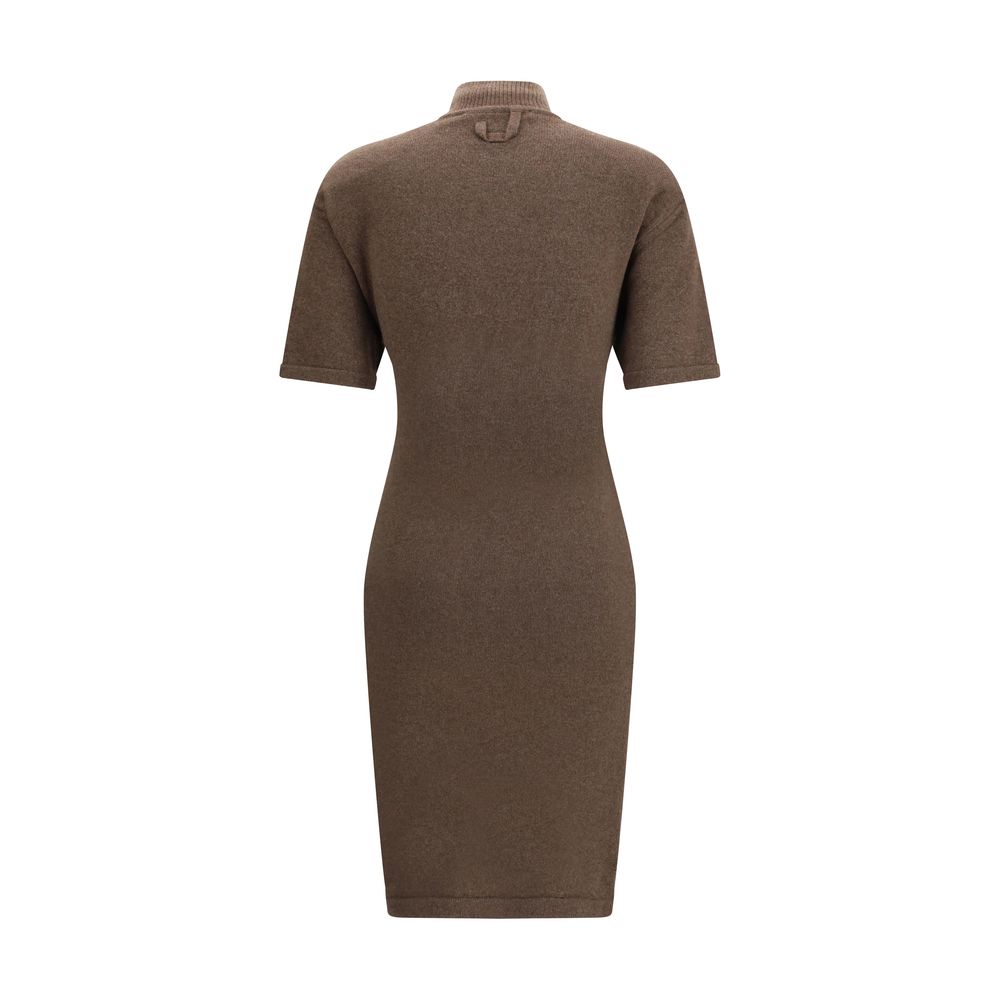 Brown Merino Wool Casual DressThe Jaquemus knit dress features structured shoulders, a high neckline, and short sleeves. With a fitted design, it combines elegance with contemporary character, perfect for a bold and refined look Season: AW25 Fit: Slim Com