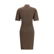 Brown Merino Wool Casual DressThe Jaquemus knit dress features structured shoulders, a high neckline, and short sleeves. With a fitted design, it combines elegance with contemporary character, perfect for a bold and refined look Season: AW25 Fit: Slim Com