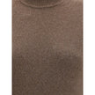 Brown Merino Wool Casual DressThe Jaquemus knit dress features structured shoulders, a high neckline, and short sleeves. With a fitted design, it combines elegance with contemporary character, perfect for a bold and refined look Season: AW25 Fit: Slim Com