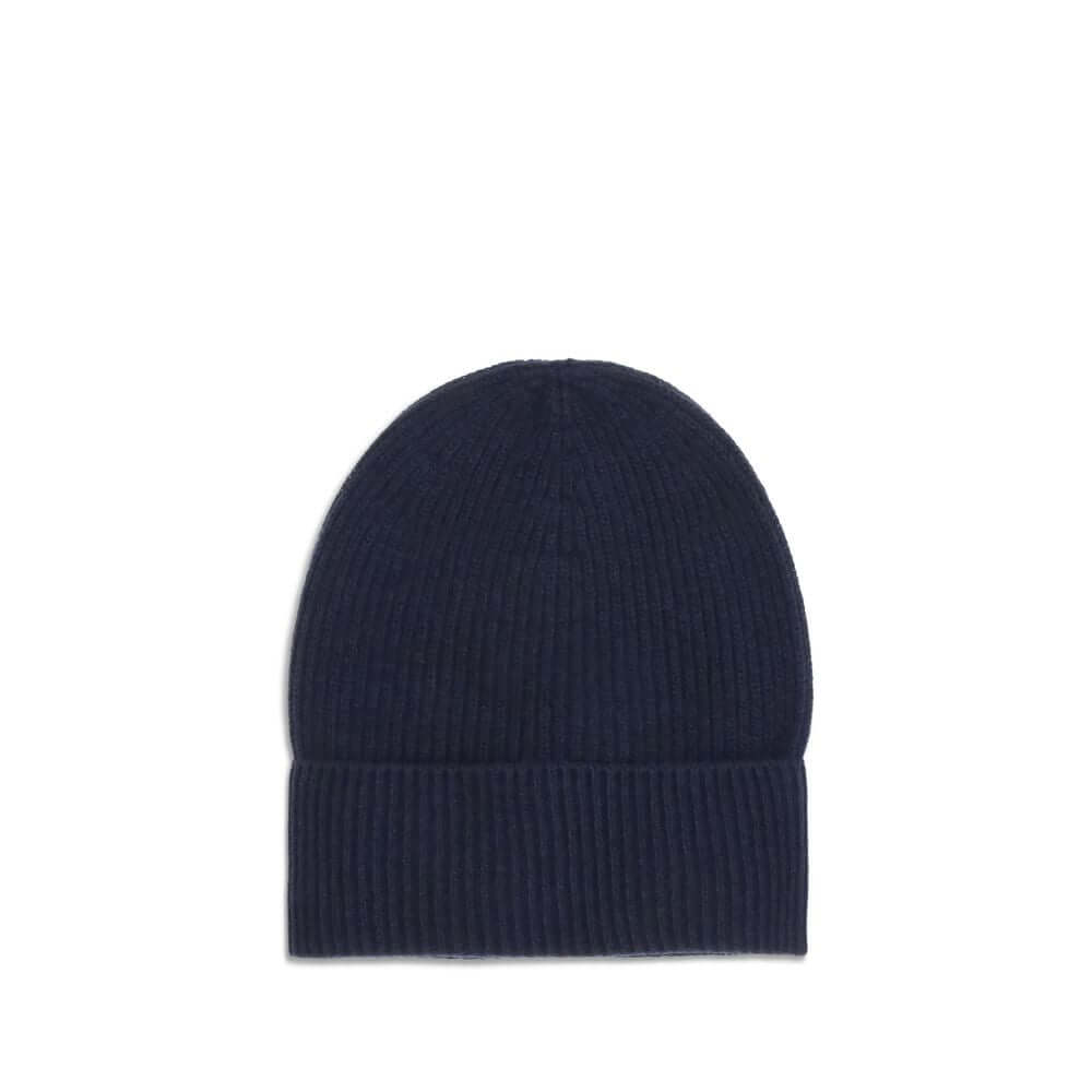 Blue Wool BeanieThe Moncler wool and cashmere hat is crafted from a soft blend of blue virgin wool and cashmere, using Italian craftsmanship. One size fits all, it guarantees warmth, comfort, and a touch of elegance. Season: AW25 Composition: 70% Wool 30%