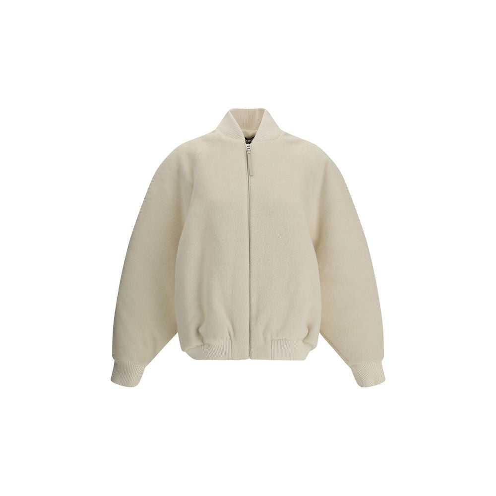 White Wool BomberThe Jacquemus Le Blouson Pilu jacket in white alpaca wool features a round neckline, front zip closure, and raglan long sleeves. Finished with ribbed wool edges, it combines comfort and sophisticated design in a contemporary piece Season: