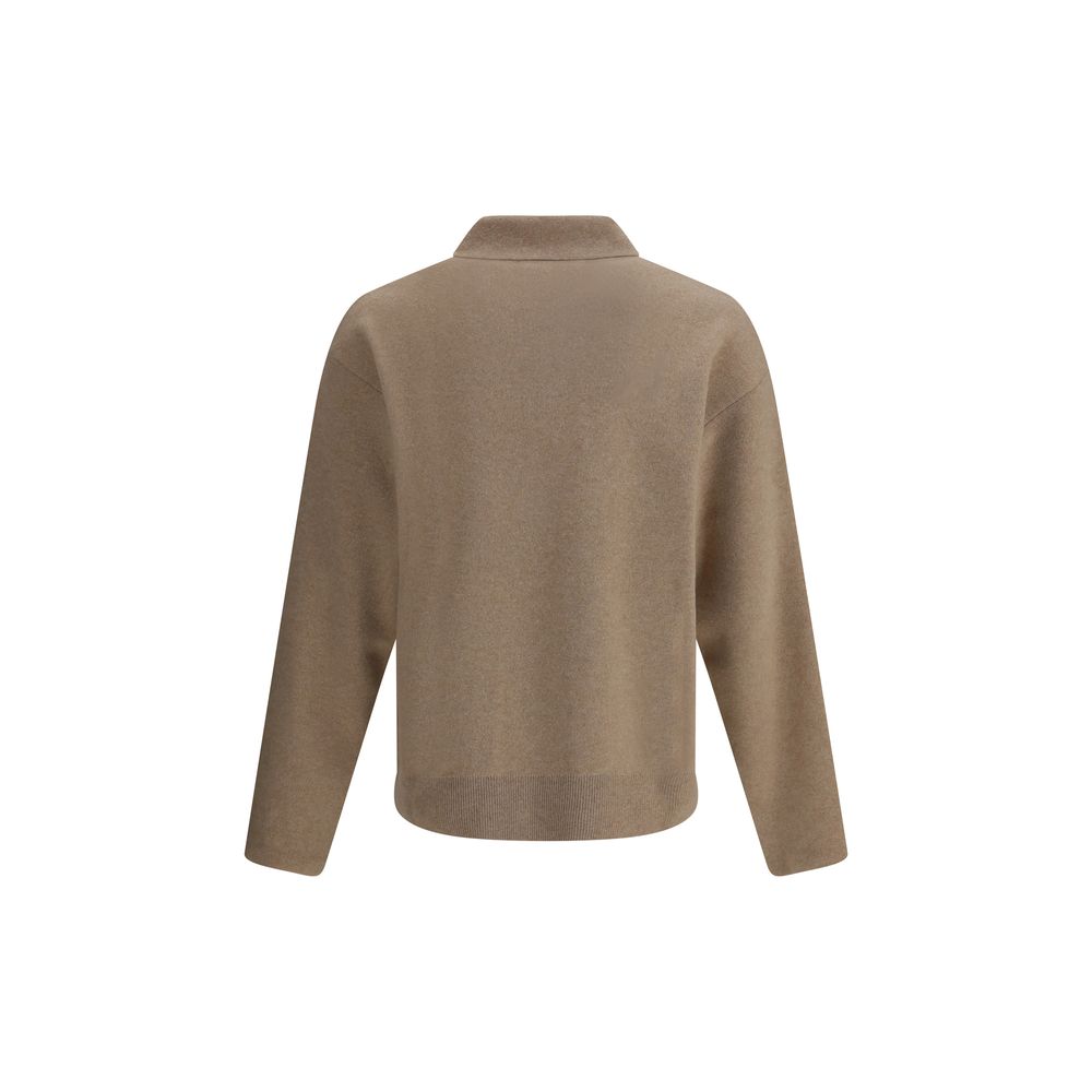 Sweater in merino WoolThe Wool Blend Sweater by Jacquemus reinterprets wardrobe codes with a poetic and contemporary touch. Featuring a pointed collar and a button fastening with a subtle retro flair, this piece combines comfort and character in a careful