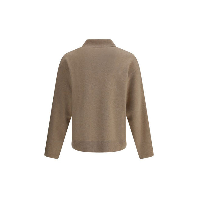 Sweater in merino WoolThe Wool Blend Sweater by Jacquemus reinterprets wardrobe codes with a poetic and contemporary touch. Featuring a pointed collar and a button fastening with a subtle retro flair, this piece combines comfort and character in a careful