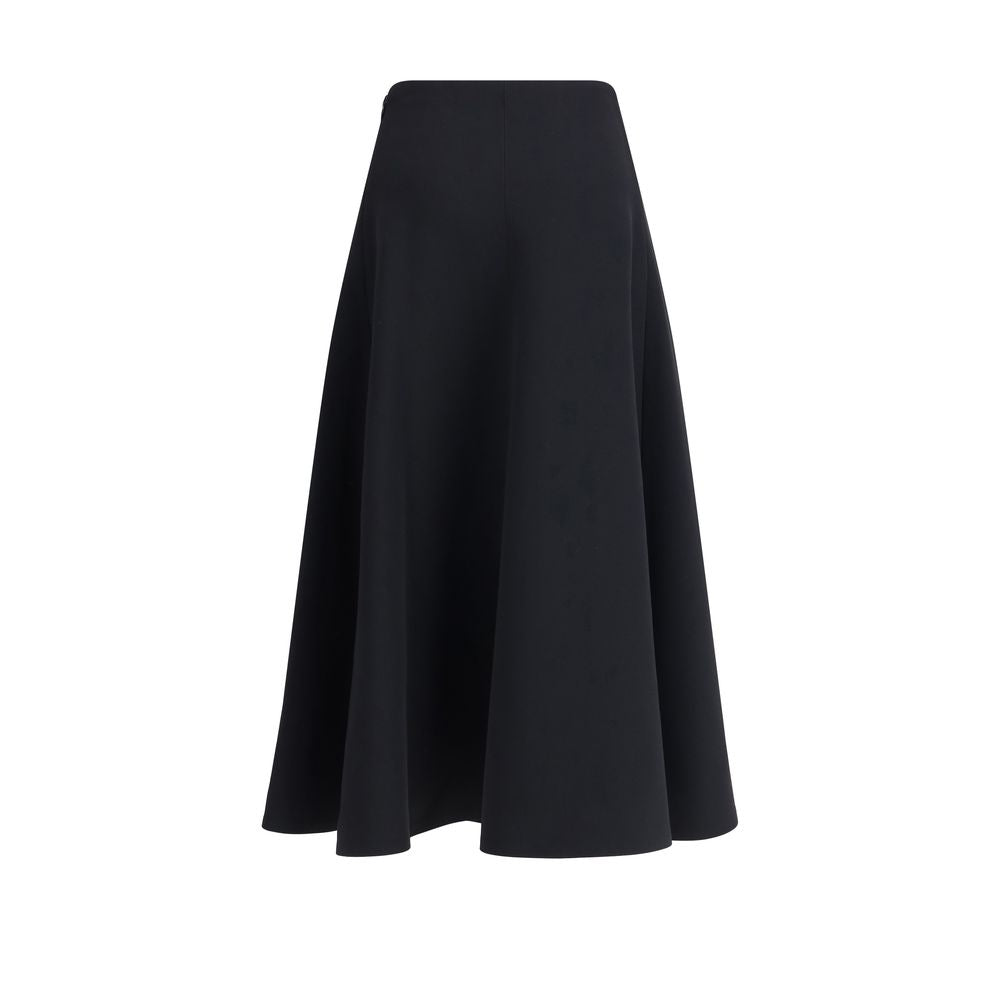 Black Cotton Midi SkirtThe black Jupe Triangle Skirt features a concealed zip closure, flared silhouette, and midi length, offering an essential and feminine look suitable for various occasions Season: AW25 Fit: Regular Composition: 100% Cotton MADE IN RO