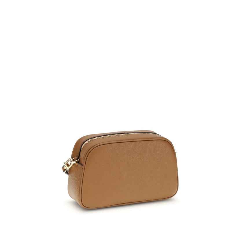 Brown Calf Leather Bos Taurus Shoulder BagThe Jet Set Bag by Michael Kors features a functional and elegant design, with a convenient open front pocket and a secure zip closure. The shoulder strap is removable and adjustable, with gold-tone metal details