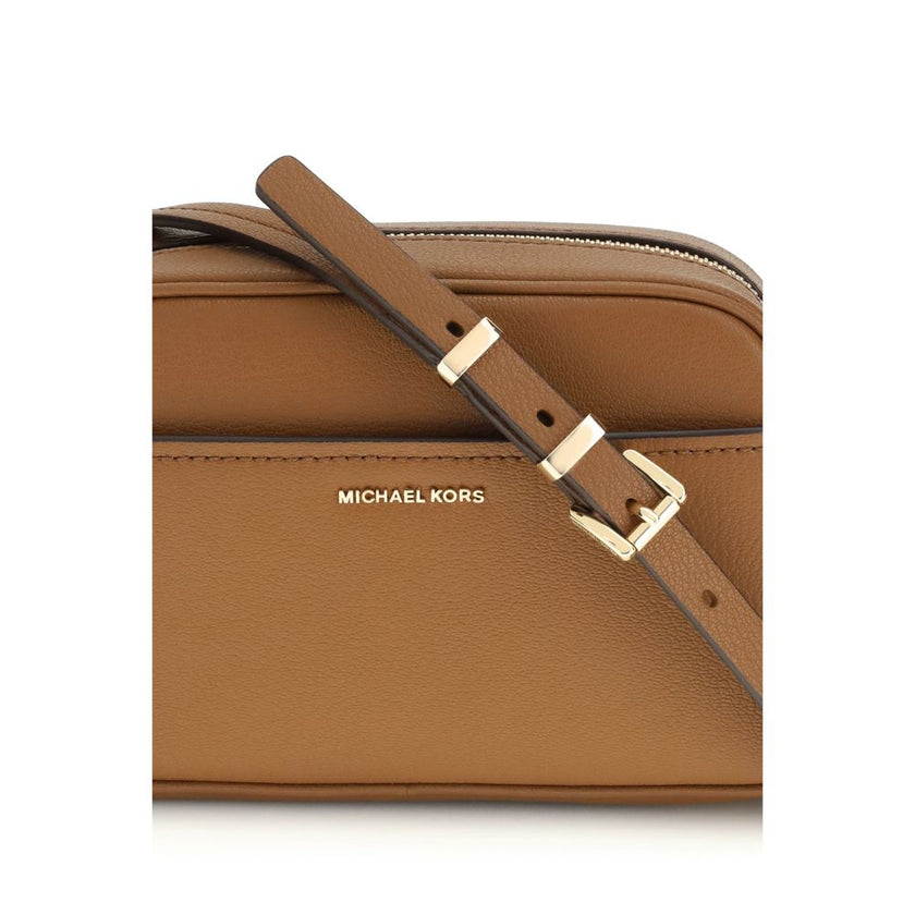 Brown Calf Leather Bos Taurus Shoulder BagThe Jet Set Bag by Michael Kors features a functional and elegant design, with a convenient open front pocket and a secure zip closure. The shoulder strap is removable and adjustable, with gold-tone metal details