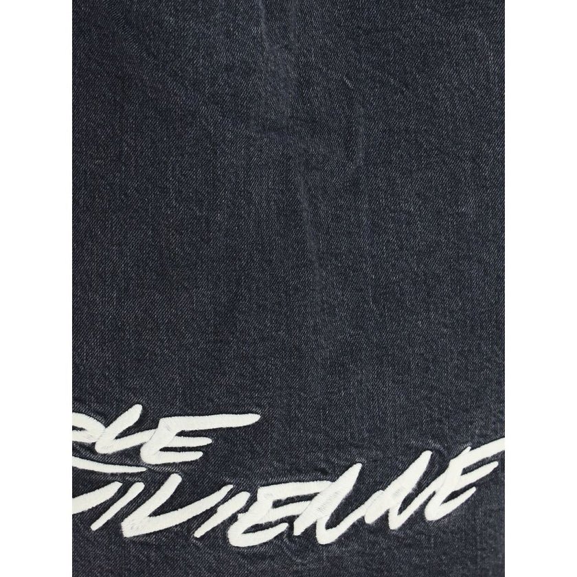 Black Denim ShirtThe Kenzo x Futura 2000 Japanese stone bleach wash denim shirt features a classic collar, single-breasted closure, button cuffs, and Futura 2000 Boke Flower embroidery on the chest, complemented by a logo label on the back. Season: AW25 F