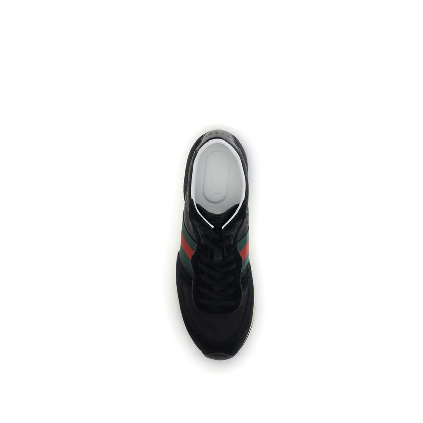 Black Polyamide Athletic SneakersThe Nora Sneakers by Gucci combine sporty heritage and contemporary style. Crafted from black Original GG canvas with suede trim and GG nylon inserts, they feature the iconic green and red Web stripe on the sides. The rubb