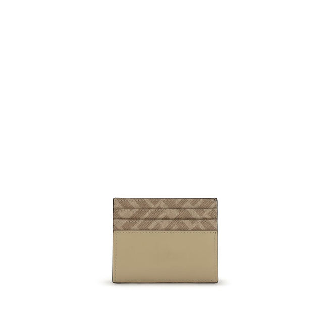 Beige Calf Leather Bos Taurus WalletThe Squared Card Holder by Fendi is a compact and elegant accessory, featuring six card slots and a central flat pocket. Crafted in beige leather, it is enriched with tone-on-tone FF canvas details and finished with a m