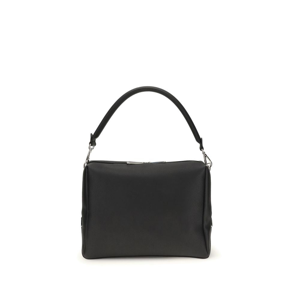 Black Calf Leather Bos Taurus Shoulder BagThe Lui Large Shoulder Bag by Fendi is an elegant and versatile accessory, designed for a contemporary and refined style. It features a soft construction and carefully crafted details, such as the long double-slid