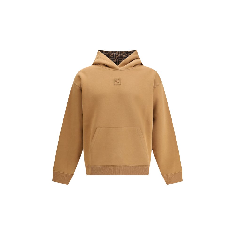 Beige Cotton SweatshirtFendi’s monochrome cotton Hoodie is a garment that combines comfort and refined style. The ribbed crew neck, cuffs and hem ensure a perfect fit and clean lines. The iconic FF logo, embroidered tone-on-tone on the front, adds a discr