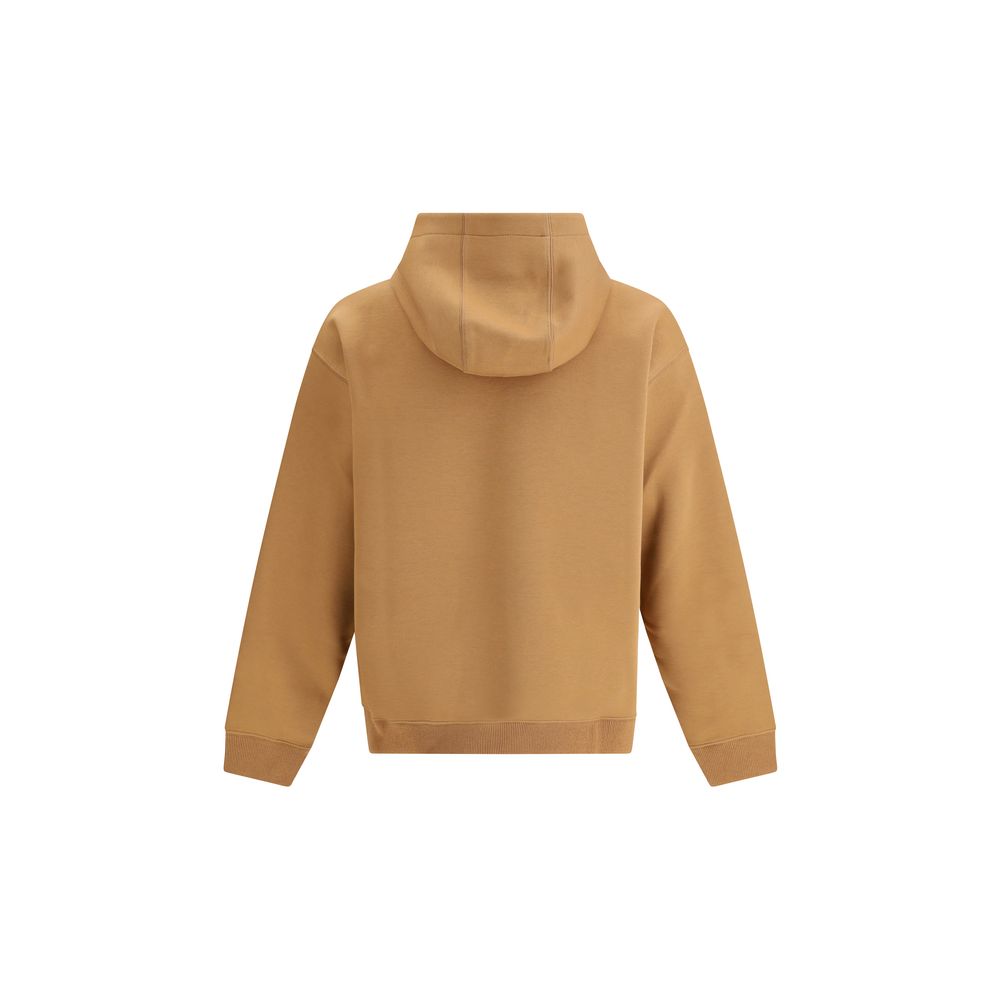Beige Cotton SweatshirtFendi’s monochrome cotton Hoodie is a garment that combines comfort and refined style. The ribbed crew neck, cuffs and hem ensure a perfect fit and clean lines. The iconic FF logo, embroidered tone-on-tone on the front, adds a discr
