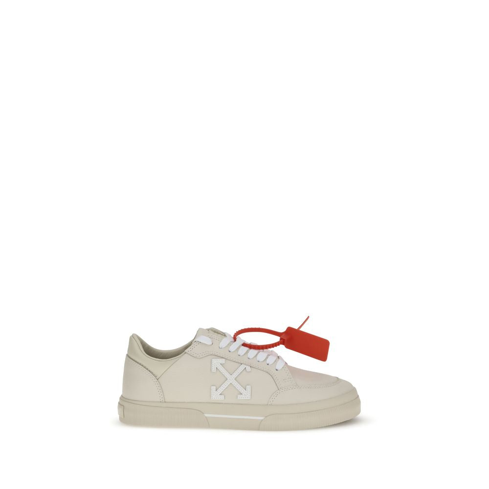 Beige Leather Low Top SneakersThe Vulcanized Sneakers by Off-White draw inspiration from skate culture, featuring a low-top silhouette and a vulcanized rubber sole. The upper, crafted from 100% leather, is embroidered with the iconic Arrow motif and finis