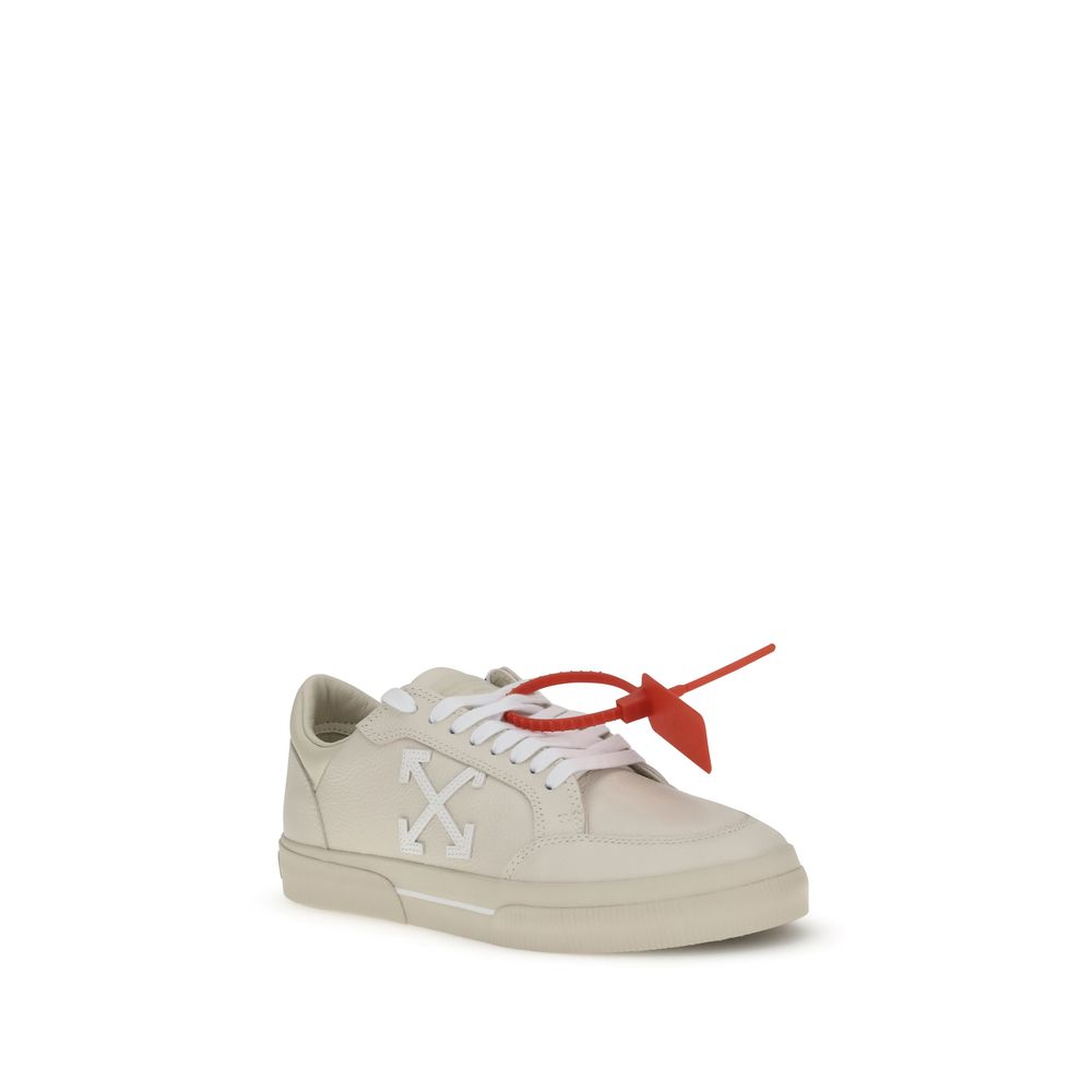 Beige Leather Low Top SneakersThe Vulcanized Sneakers by Off-White draw inspiration from skate culture, featuring a low-top silhouette and a vulcanized rubber sole. The upper, crafted from 100% leather, is embroidered with the iconic Arrow motif and finis