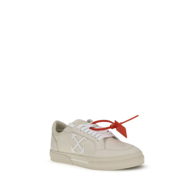 Beige Leather Low Top SneakersThe Vulcanized Sneakers by Off-White draw inspiration from skate culture, featuring a low-top silhouette and a vulcanized rubber sole. The upper, crafted from 100% leather, is embroidered with the iconic Arrow motif and finis