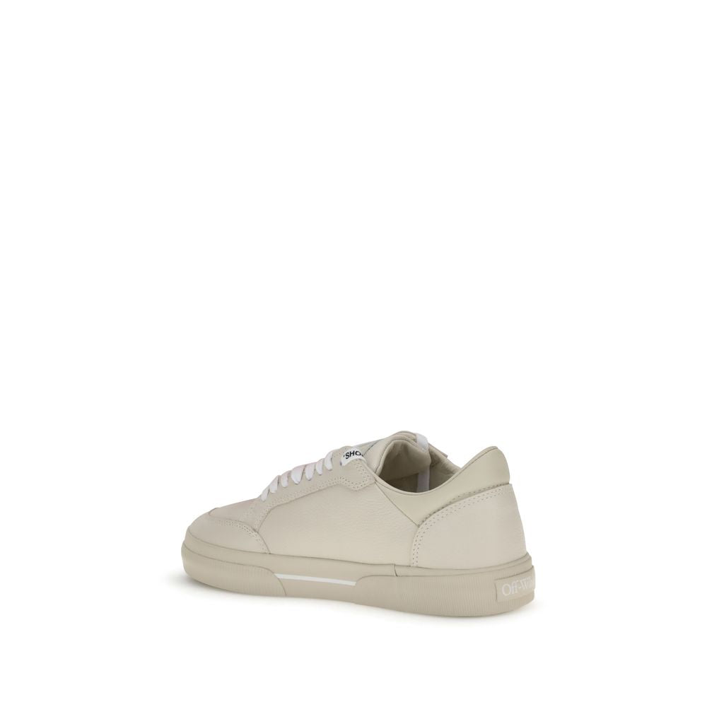 Beige Leather Low Top SneakersThe Vulcanized Sneakers by Off-White draw inspiration from skate culture, featuring a low-top silhouette and a vulcanized rubber sole. The upper, crafted from 100% leather, is embroidered with the iconic Arrow motif and finis