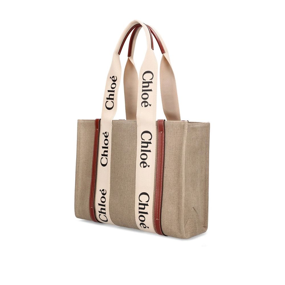 Beige Linen Tote BagDescription: – Composition: 100% Linen – Leather detail – Lenght 37 cm – Double shoulder strap – Internal flat pocket – Height: 26 cm – 1 spacious main compartment – Made in Italy – Gender: WOMEN –Beige Linen Tote Bag${tagsChloéAulae B