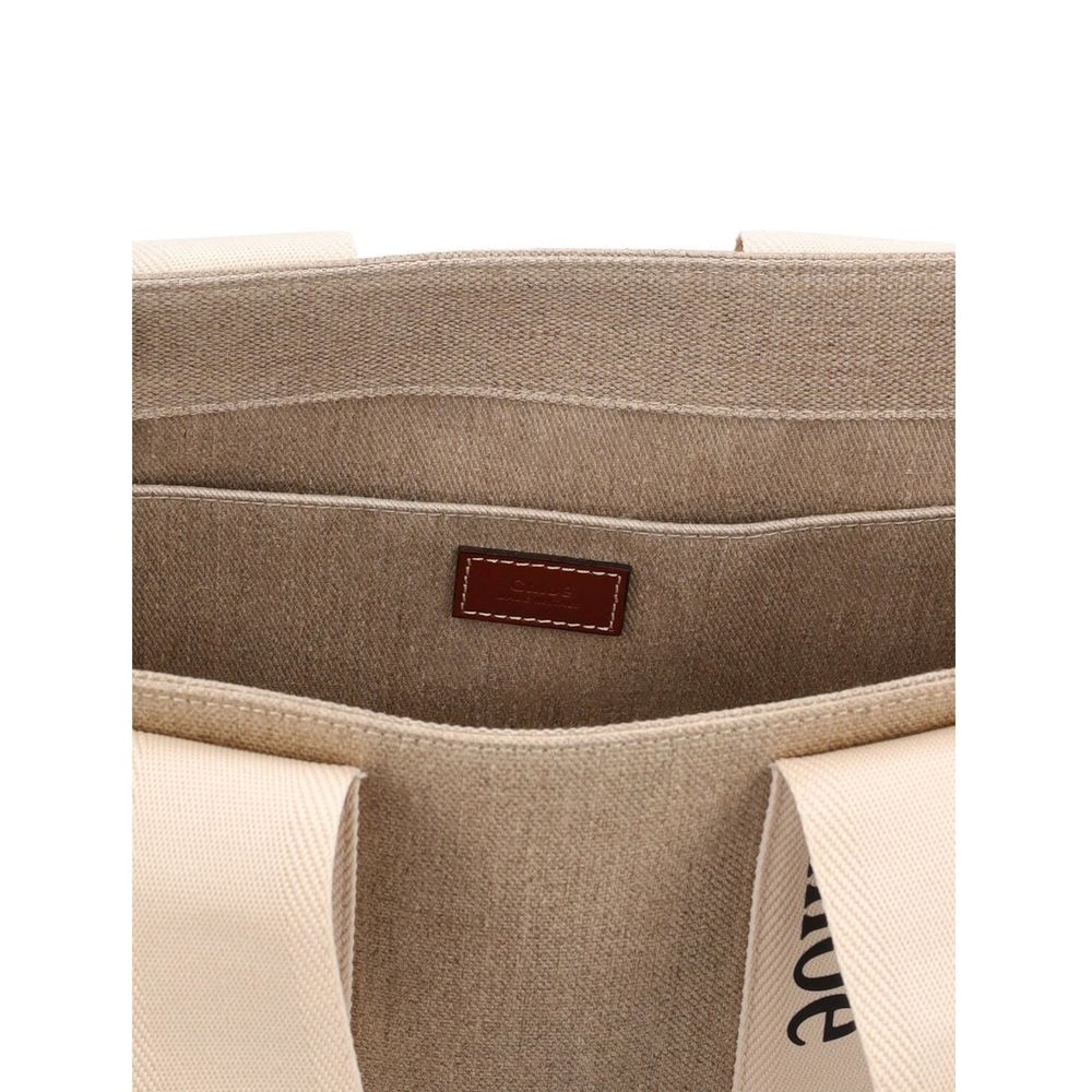 Beige Linen Tote BagDescription: – Composition: 100% Linen – Leather detail – Lenght 37 cm – Double shoulder strap – Internal flat pocket – Height: 26 cm – 1 spacious main compartment – Made in Italy – Gender: WOMEN –Beige Linen Tote Bag${tagsChloéAulae B