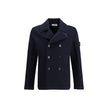 Blue Fleece Wool CoatThe Wool felt Coat by Stone Island features an oversized fit and functional design. Featuring chest patch pockets and a snap-button closure, it is complemented by the distinctive Stone Island badge on the left sleeve, a symbol of qual