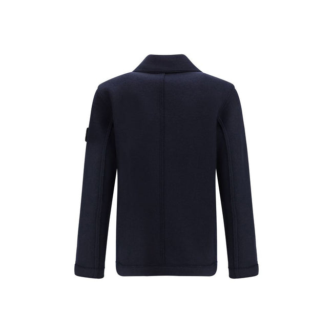 Blue Fleece Wool CoatThe Wool felt Coat by Stone Island features an oversized fit and functional design. Featuring chest patch pockets and a snap-button closure, it is complemented by the distinctive Stone Island badge on the left sleeve, a symbol of qual