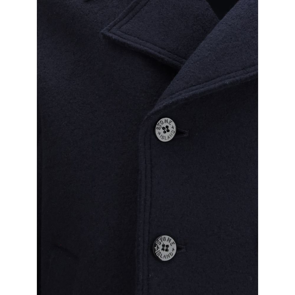 Blue Fleece Wool CoatThe Wool felt Coat by Stone Island features an oversized fit and functional design. Featuring chest patch pockets and a snap-button closure, it is complemented by the distinctive Stone Island badge on the left sleeve, a symbol of qual