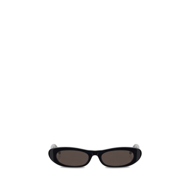 Black Acetate SunglassesSunglasses by Saint Laurent, cut-out design, thin acetate frame, iconic brand signature etched on side temples, frame compatible with corrective lenses. Season: AW25 Composition: 100% Acetate MADE IN ITALYBlack Acetate Sunglasses${