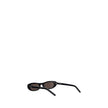 Black Acetate SunglassesSunglasses by Saint Laurent, cut-out design, thin acetate frame, iconic brand signature etched on side temples, frame compatible with corrective lenses. Season: AW25 Composition: 100% Acetate MADE IN ITALYBlack Acetate Sunglasses${