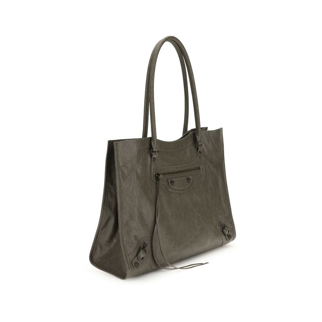Green Lamb Ovis Aries Aries Shoulder BagThe Le City Tote Bag by Balenciaga is crafted from soft Arena lambskin leather with a vintage finish, offering a spacious and structured silhouette. Designed with two top handles (drop: 23.8 cm), it’s ideal for shou