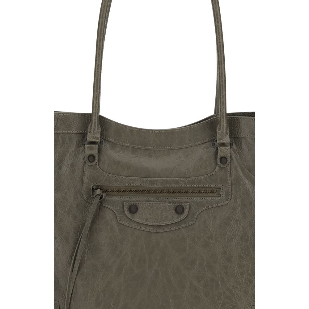 Green Lamb Ovis Aries Aries Shoulder BagThe Le City Tote Bag by Balenciaga is crafted from soft Arena lambskin leather with a vintage finish, offering a spacious and structured silhouette. Designed with two top handles (drop: 23.8 cm), it’s ideal for shou